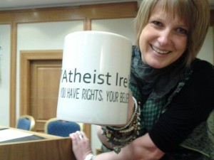 Leonie Hilliard advertises special Atheist Ireland mug