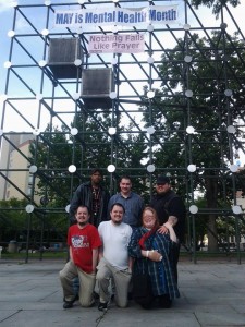 NEPA Freethought Society members pose under 'Nothing Fails Like Prayer' banner